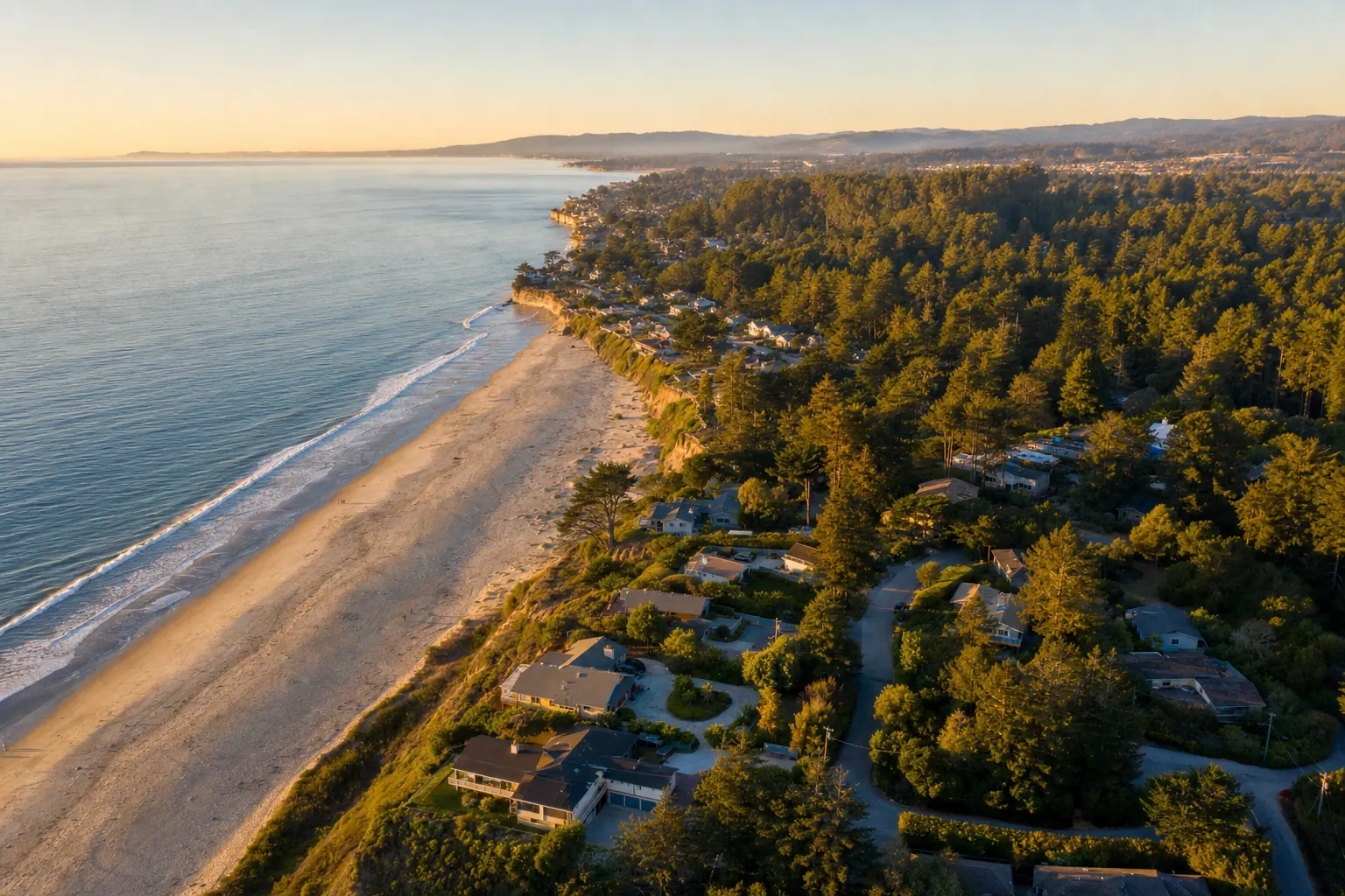 Aerial view of the Aptos, California coastline and beachside neighborhoods