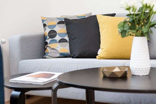 Coffee%20Table%20Beside%20Sofa%20With%20Three%20Pillows