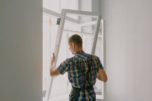 man-fixing-a-house-door man-fixing-a-house-door