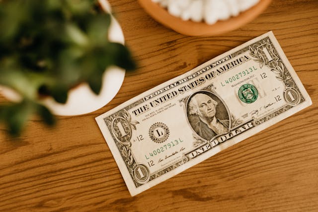 Dollar bill on a table