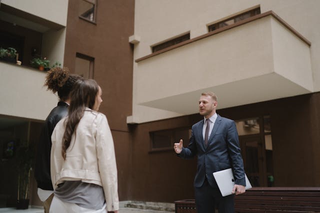 a%20landlord%20speaking%20with%20tenants a%20landlord%20speaking%20with%20tenants